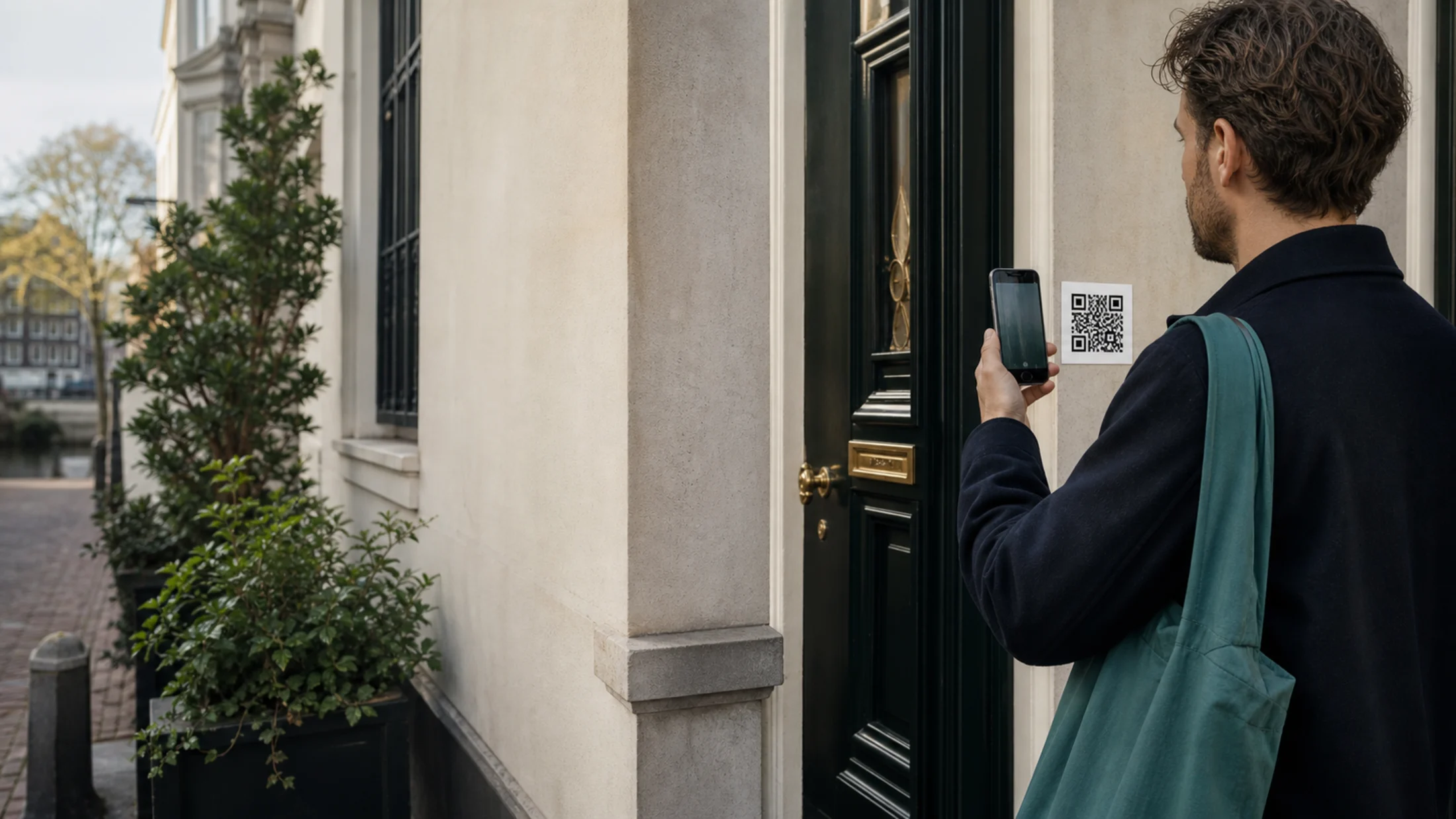 Visitor scans a Knockly QR code at an apartment door